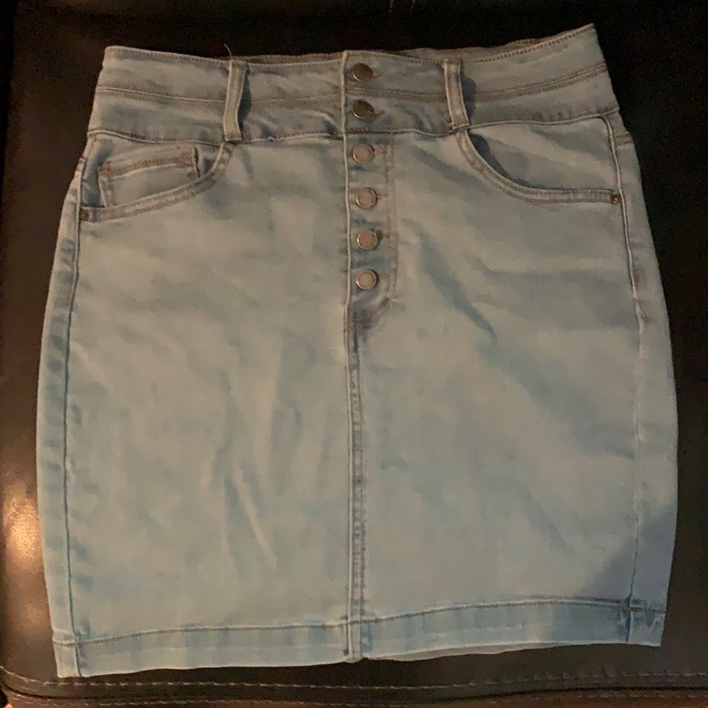Denim miniskirt button fly very cute.